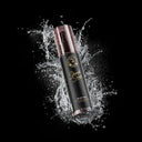 SHARK SURF Sea Salt Spray bottle with dynamic water splash on black background
