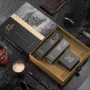 Open Apex Collection hair styling kit on marble beside a watch, notebook, pen and candle.